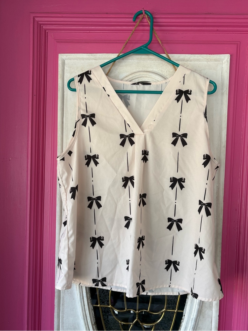 Cream Sleeveless V-Neck Bow Print Top